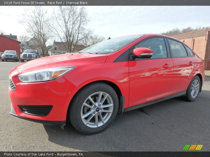 Race Red / Charcoal Black 2016 Ford Focus SE Sedan