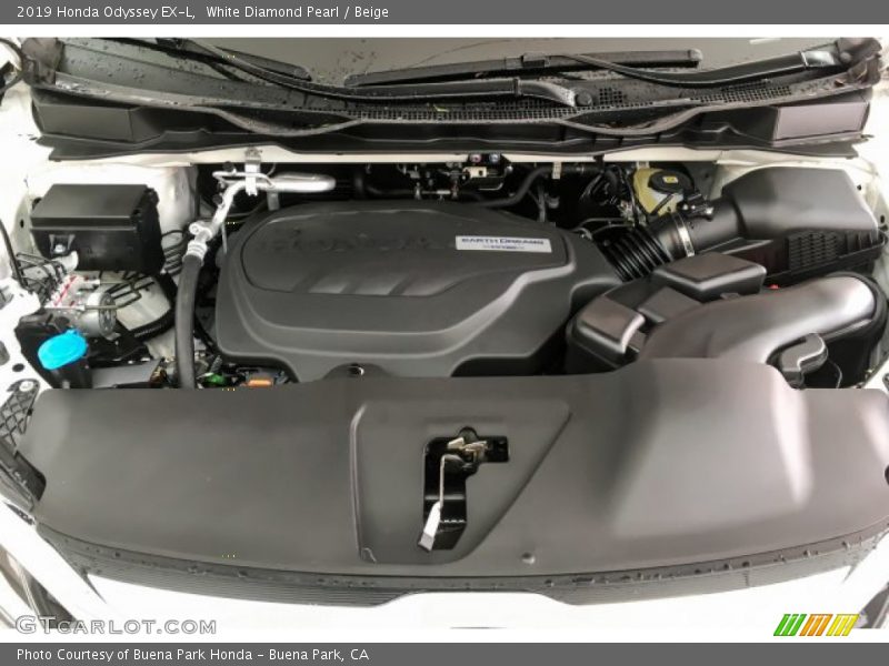 White Diamond Pearl / Beige 2019 Honda Odyssey EX-L