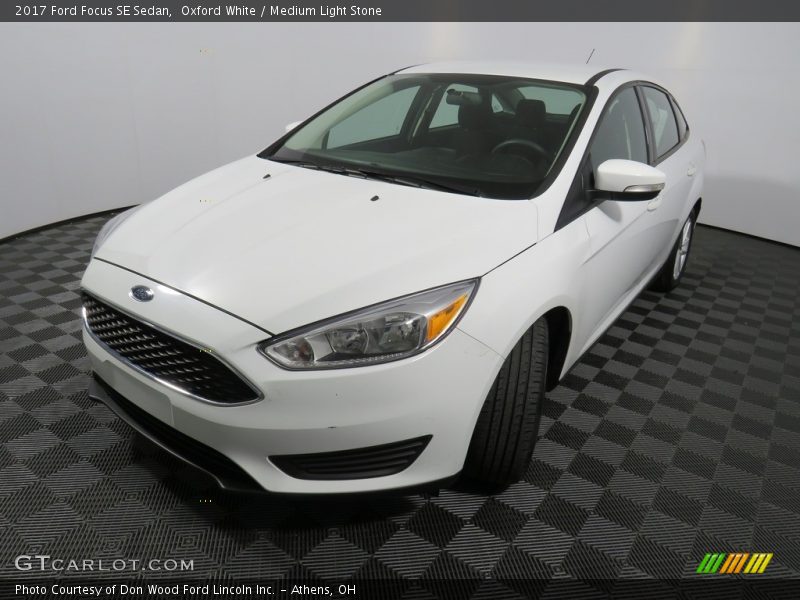 Oxford White / Medium Light Stone 2017 Ford Focus SE Sedan