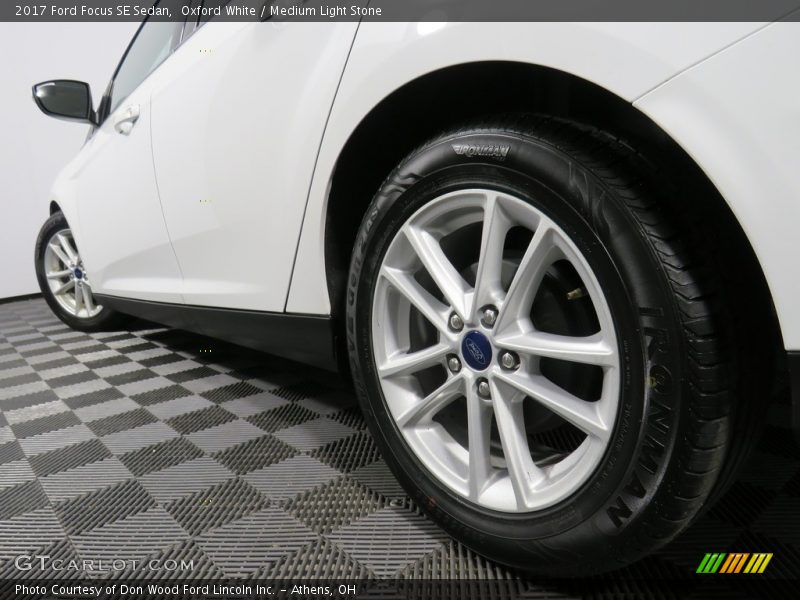 Oxford White / Medium Light Stone 2017 Ford Focus SE Sedan