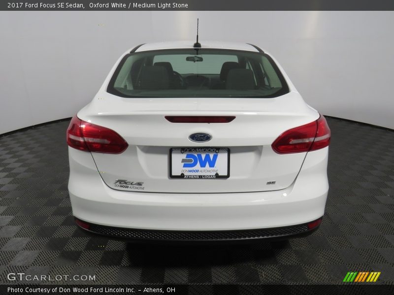 Oxford White / Medium Light Stone 2017 Ford Focus SE Sedan