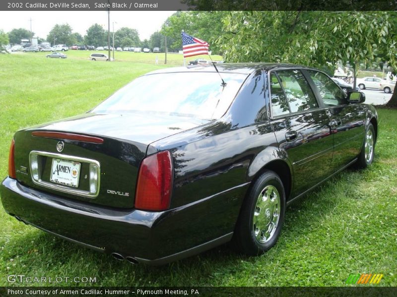 Sable Black / Oatmeal 2002 Cadillac DeVille Sedan