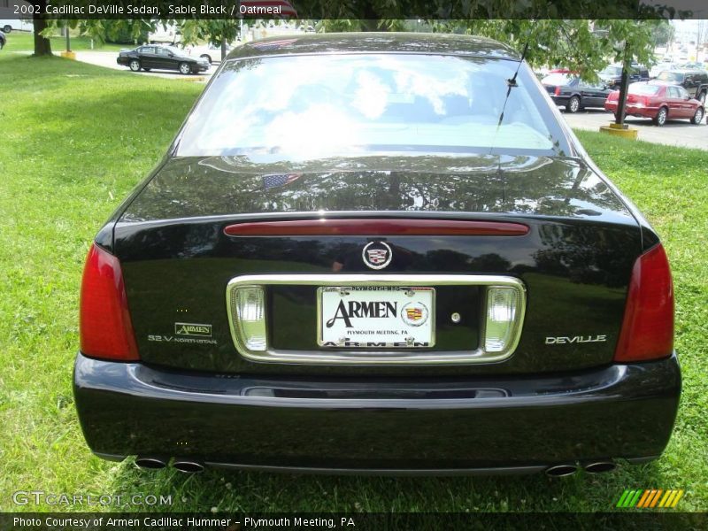 Sable Black / Oatmeal 2002 Cadillac DeVille Sedan