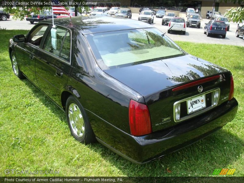Sable Black / Oatmeal 2002 Cadillac DeVille Sedan