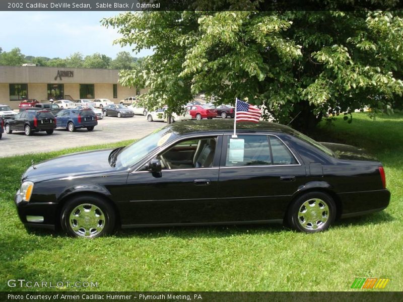 Sable Black / Oatmeal 2002 Cadillac DeVille Sedan