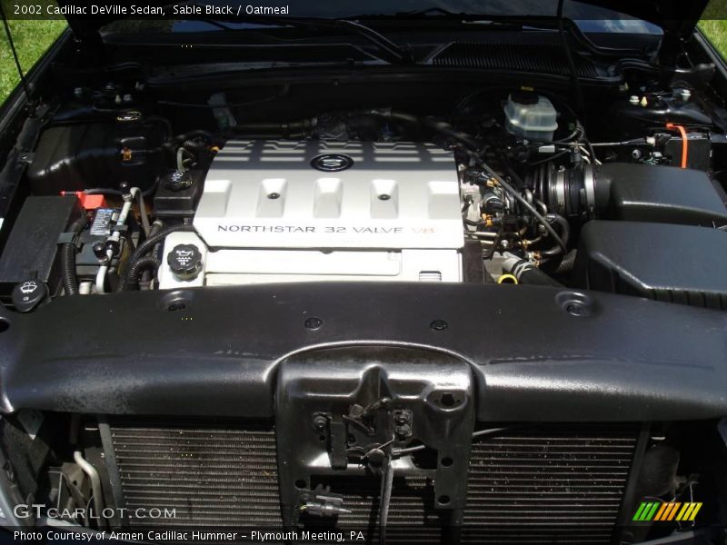 Sable Black / Oatmeal 2002 Cadillac DeVille Sedan