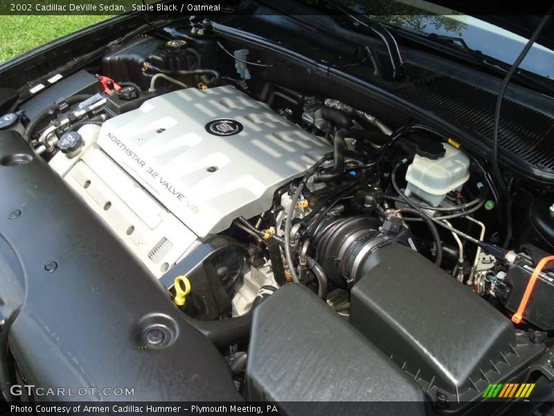 Sable Black / Oatmeal 2002 Cadillac DeVille Sedan