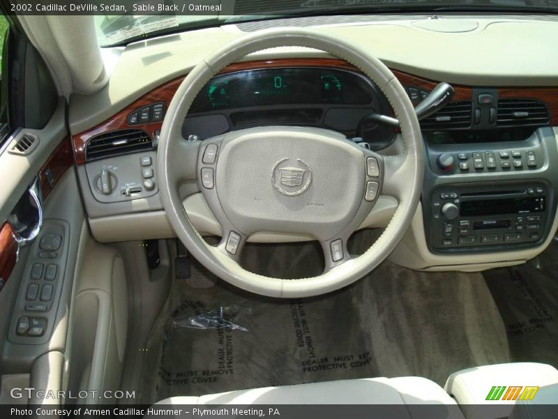 Sable Black / Oatmeal 2002 Cadillac DeVille Sedan