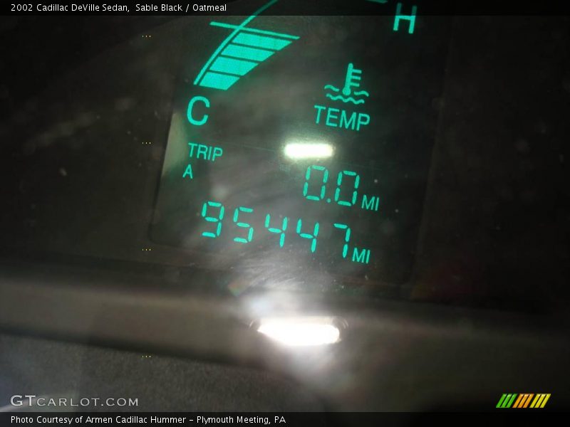 Sable Black / Oatmeal 2002 Cadillac DeVille Sedan