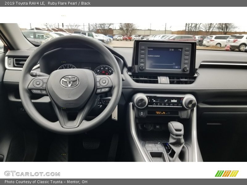 Ruby Flare Pearl / Black 2019 Toyota RAV4 LE