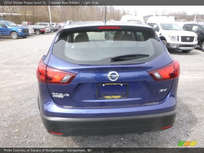 Caspian Blue Metallic / Light Gray 2019 Nissan Rogue Sport SV