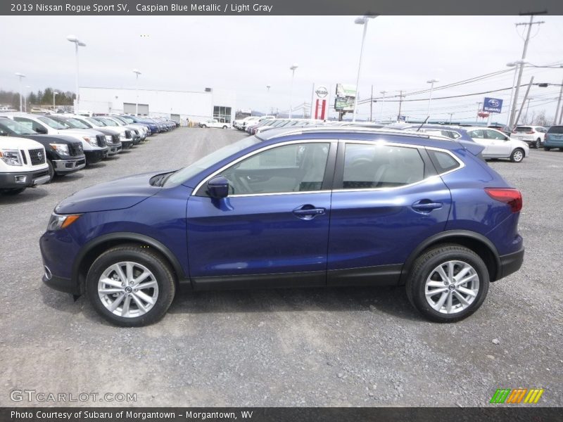 Caspian Blue Metallic / Light Gray 2019 Nissan Rogue Sport SV
