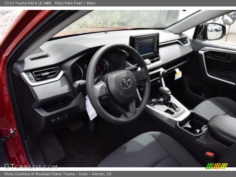 Ruby Flare Pearl / Black 2019 Toyota RAV4 LE AWD