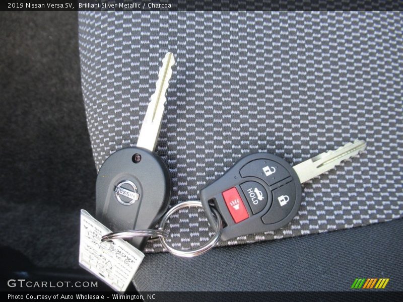 Brilliant Silver Metallic / Charcoal 2019 Nissan Versa SV