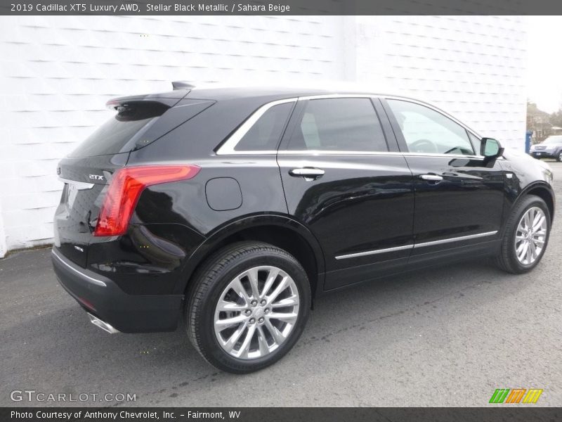 Stellar Black Metallic / Sahara Beige 2019 Cadillac XT5 Luxury AWD