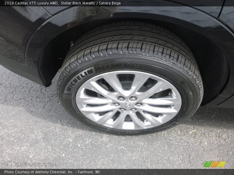 Stellar Black Metallic / Sahara Beige 2019 Cadillac XT5 Luxury AWD