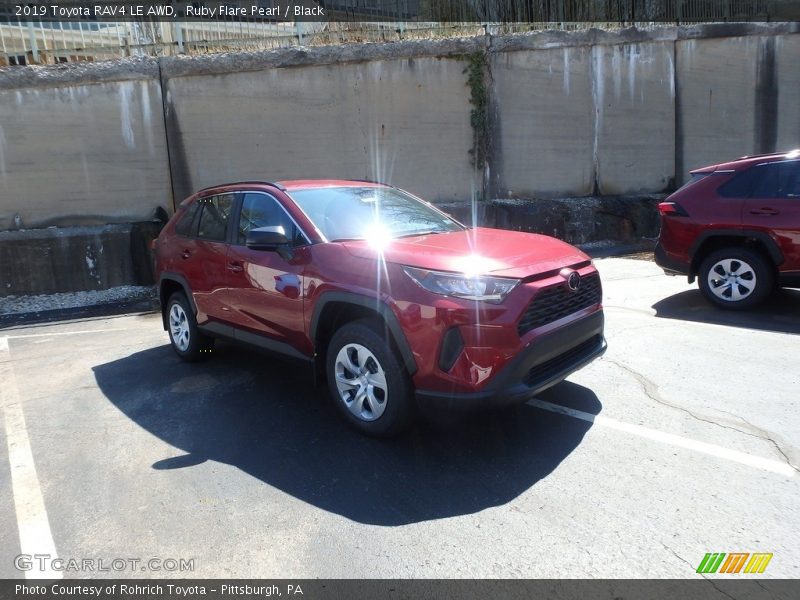 Ruby Flare Pearl / Black 2019 Toyota RAV4 LE AWD