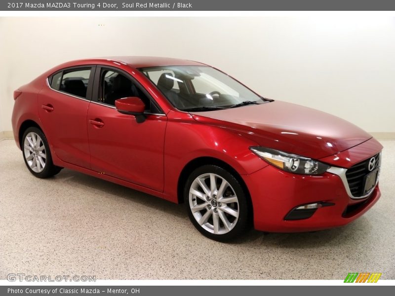 Soul Red Metallic / Black 2017 Mazda MAZDA3 Touring 4 Door