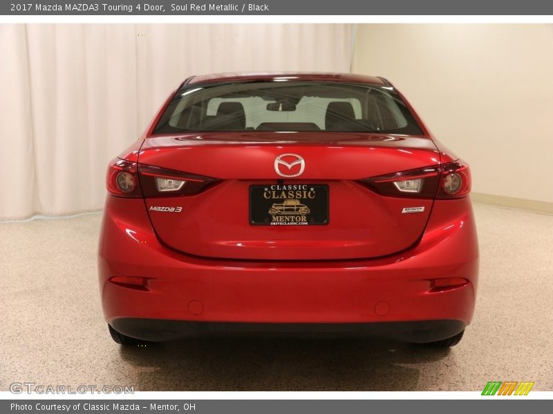 Soul Red Metallic / Black 2017 Mazda MAZDA3 Touring 4 Door