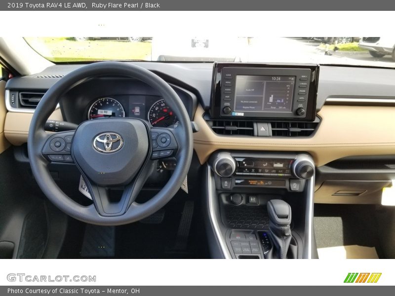 Ruby Flare Pearl / Black 2019 Toyota RAV4 LE AWD
