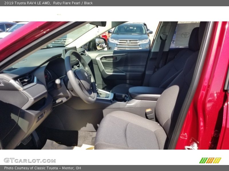 Ruby Flare Pearl / Black 2019 Toyota RAV4 LE AWD
