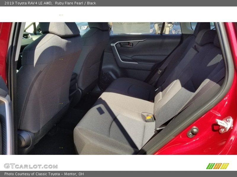 Ruby Flare Pearl / Black 2019 Toyota RAV4 LE AWD