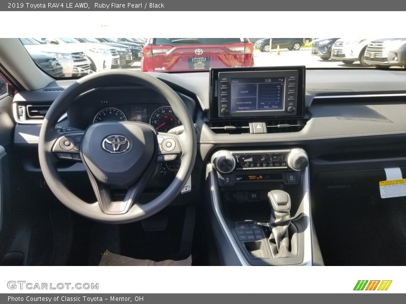 Ruby Flare Pearl / Black 2019 Toyota RAV4 LE AWD