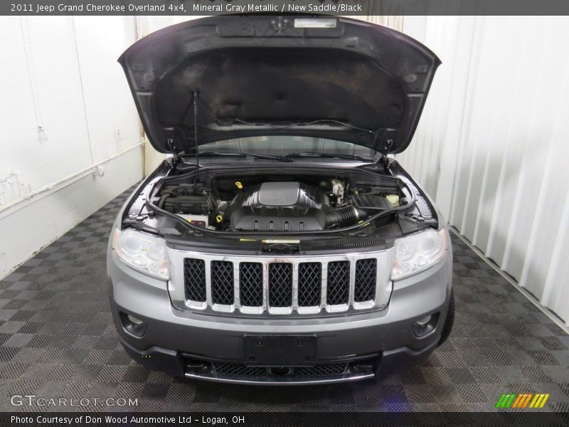 Mineral Gray Metallic / New Saddle/Black 2011 Jeep Grand Cherokee Overland 4x4