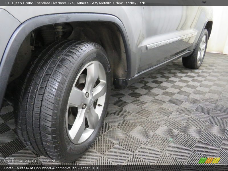 Mineral Gray Metallic / New Saddle/Black 2011 Jeep Grand Cherokee Overland 4x4