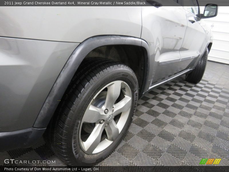 Mineral Gray Metallic / New Saddle/Black 2011 Jeep Grand Cherokee Overland 4x4