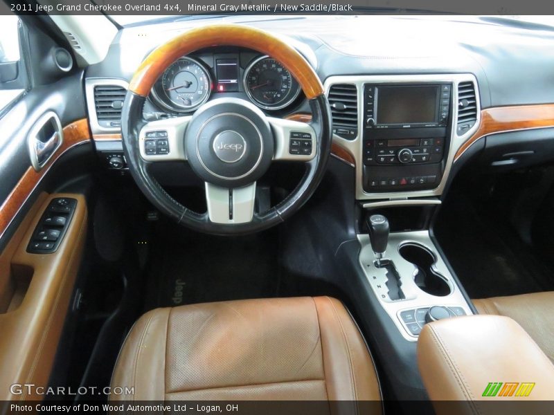 Mineral Gray Metallic / New Saddle/Black 2011 Jeep Grand Cherokee Overland 4x4