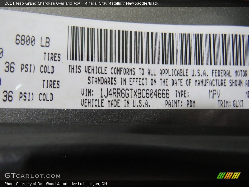 Mineral Gray Metallic / New Saddle/Black 2011 Jeep Grand Cherokee Overland 4x4