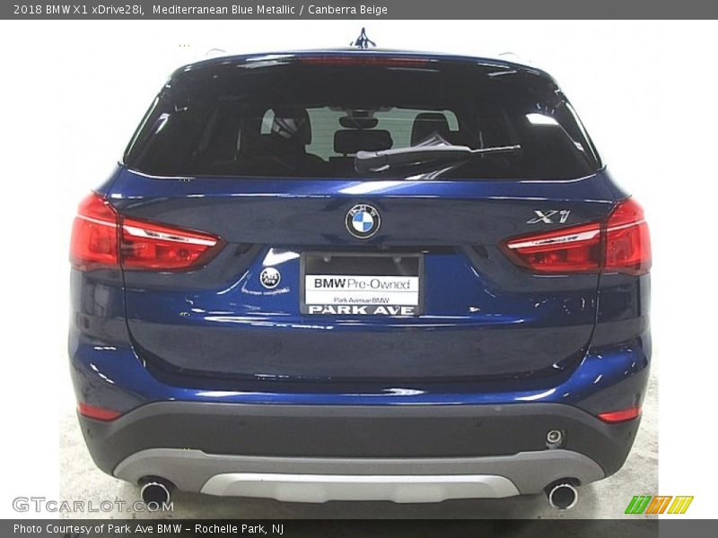 Mediterranean Blue Metallic / Canberra Beige 2018 BMW X1 xDrive28i