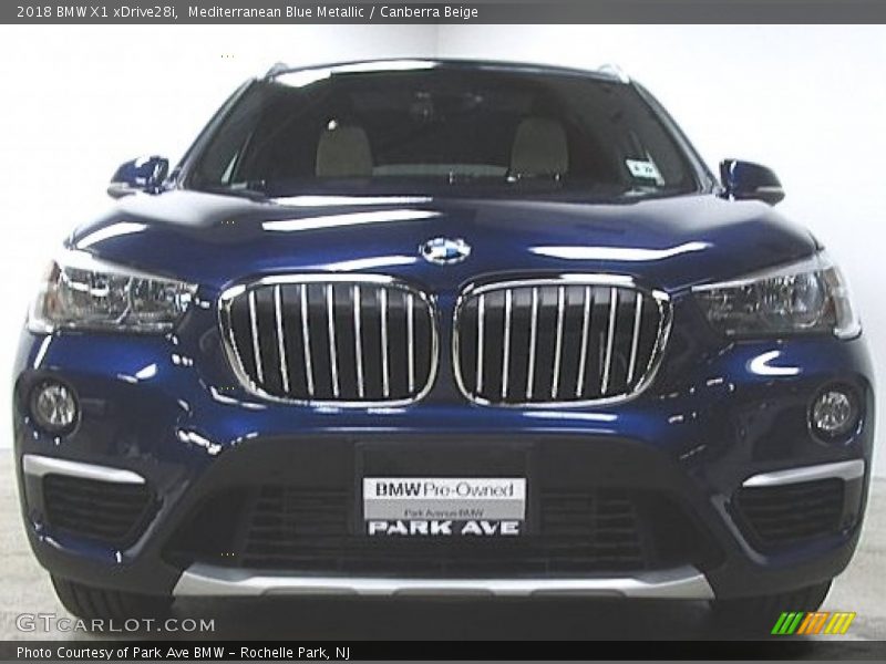 Mediterranean Blue Metallic / Canberra Beige 2018 BMW X1 xDrive28i
