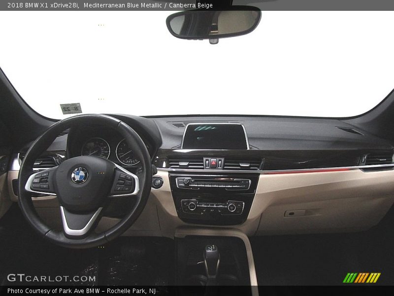 Mediterranean Blue Metallic / Canberra Beige 2018 BMW X1 xDrive28i
