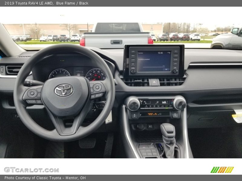 Blue Flame / Black 2019 Toyota RAV4 LE AWD