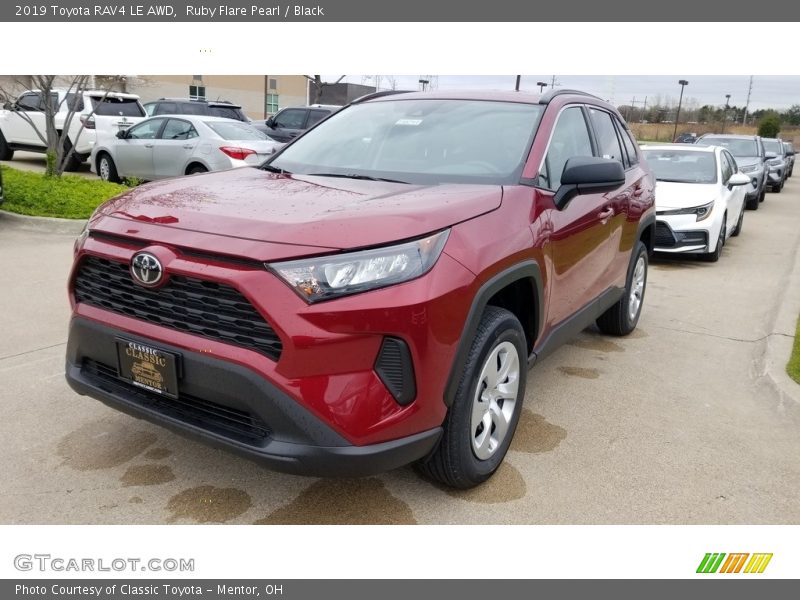 Ruby Flare Pearl / Black 2019 Toyota RAV4 LE AWD