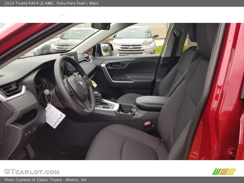 Ruby Flare Pearl / Black 2019 Toyota RAV4 LE AWD