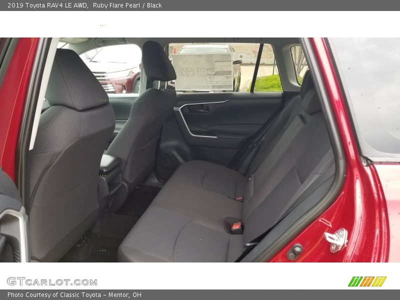 Ruby Flare Pearl / Black 2019 Toyota RAV4 LE AWD