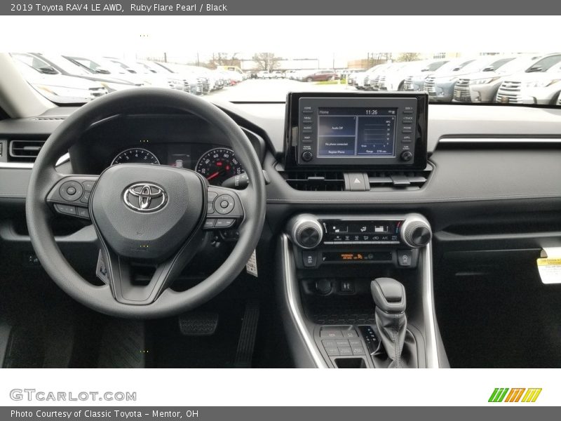Ruby Flare Pearl / Black 2019 Toyota RAV4 LE AWD