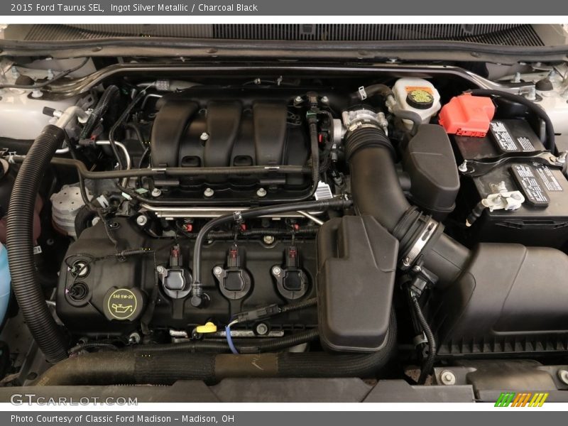 Ingot Silver Metallic / Charcoal Black 2015 Ford Taurus SEL