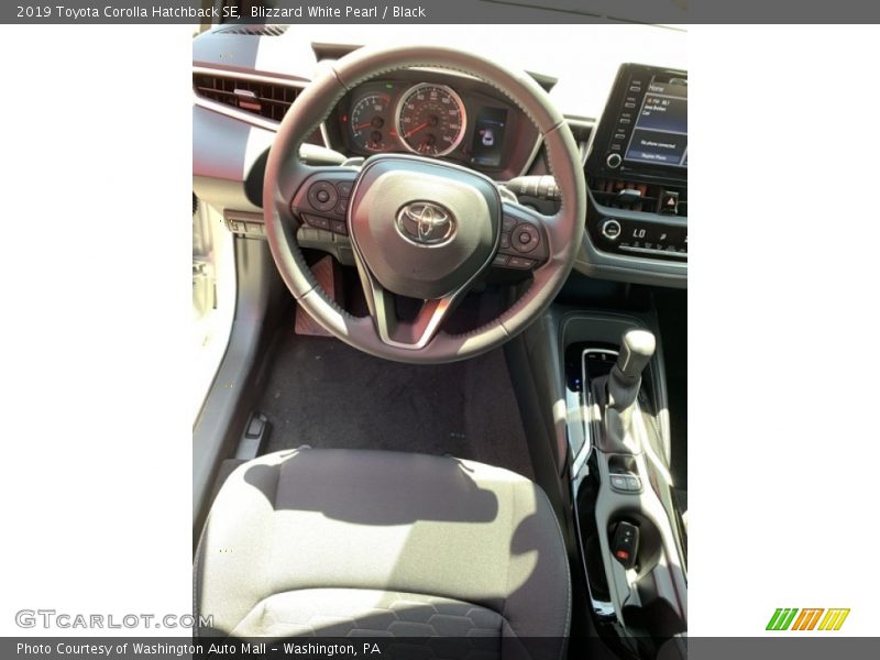 Blizzard White Pearl / Black 2019 Toyota Corolla Hatchback SE