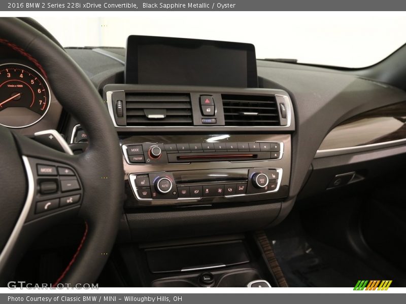 Black Sapphire Metallic / Oyster 2016 BMW 2 Series 228i xDrive Convertible