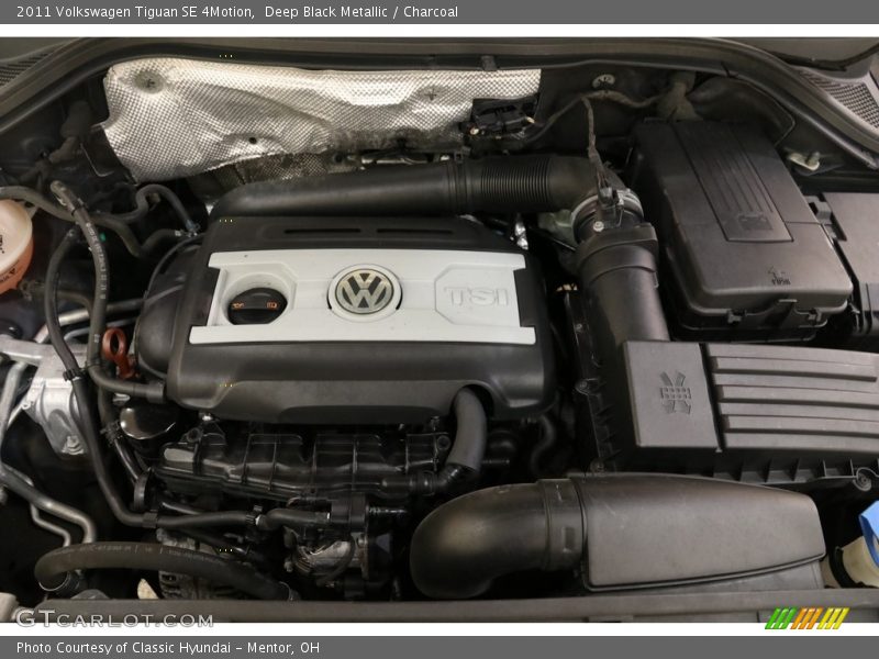 Deep Black Metallic / Charcoal 2011 Volkswagen Tiguan SE 4Motion