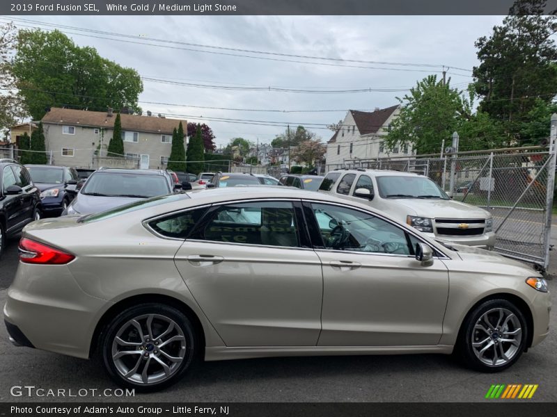 White Gold / Medium Light Stone 2019 Ford Fusion SEL