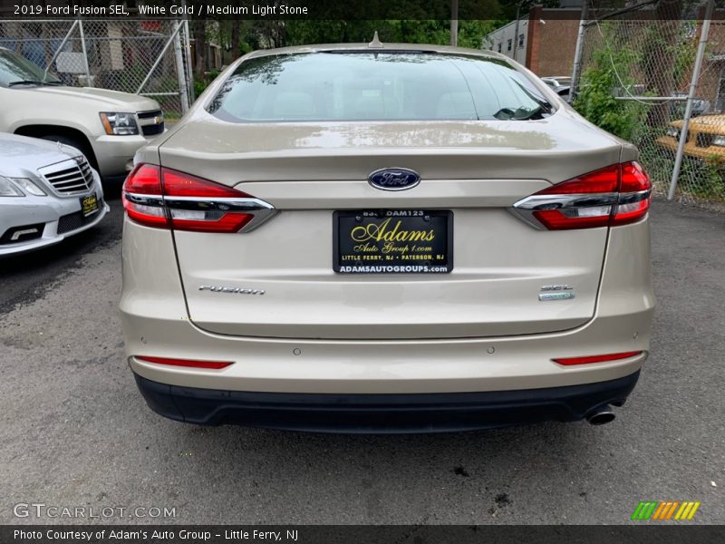 White Gold / Medium Light Stone 2019 Ford Fusion SEL