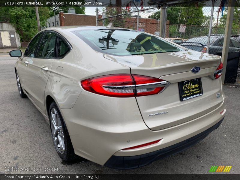 White Gold / Medium Light Stone 2019 Ford Fusion SEL