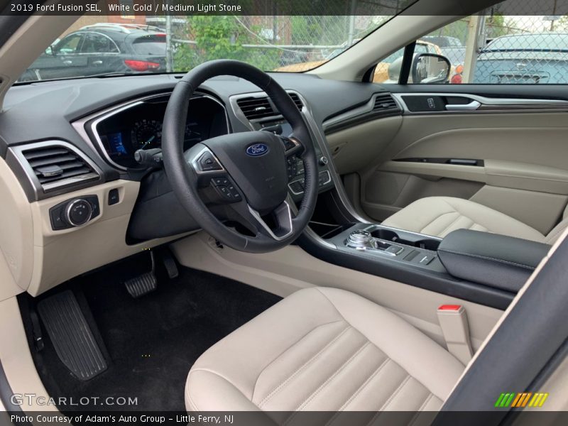  2019 Fusion SEL Medium Light Stone Interior