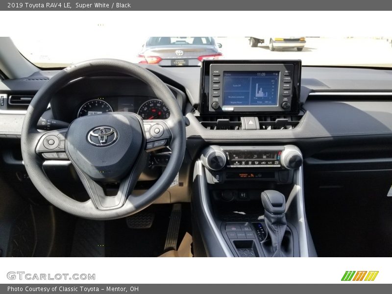 Super White / Black 2019 Toyota RAV4 LE