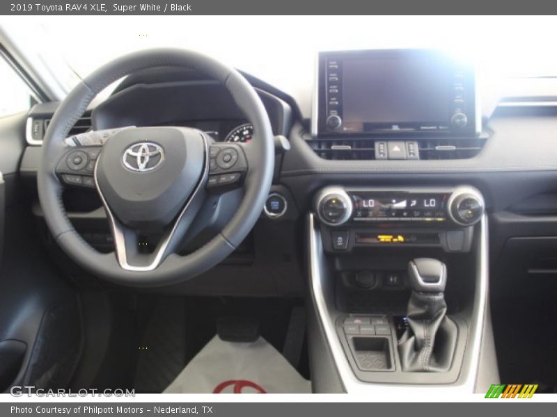 Super White / Black 2019 Toyota RAV4 XLE